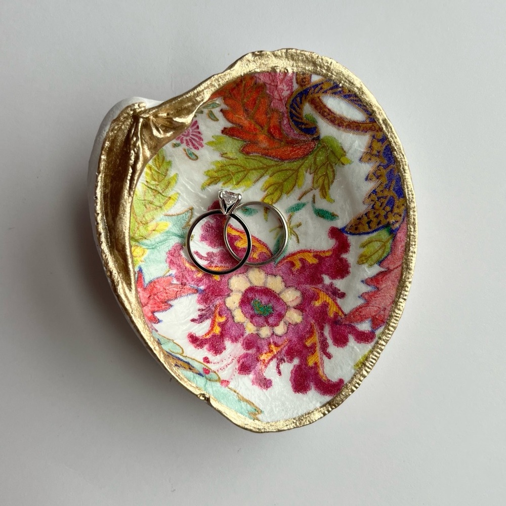 Handmade clam shell ring dish. Flower pattern with gold trim.